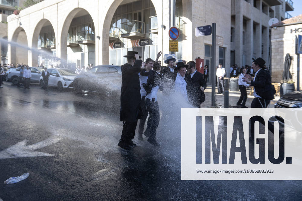 Police intervene as Ultra-Orthodox Jews block roads in West Jerusalem WEST JERUSALEM - JUNE 10: Israeli police use stun grenades and water cannons to disperse Ultra-Orthodox (Haredi) Jews blocking roads during a protest on June 10, 2026. Three demonstrators were detained during the incidents in West Jerusalem, where crowds gathered to protest against compulsory military service. Mostafa Alkharouf Anadolu Jerusalem Israel. Editorial use only. Please get in touch for any other usage.