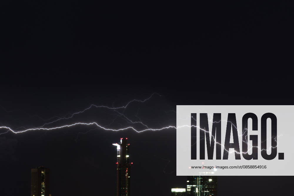 Lightning flashes over part of the financial district skyline during a thunderstorm in Frankfurt am Main, Germany. Frankfurt Germany - ZUMAb332 20260610_zip_b332_015