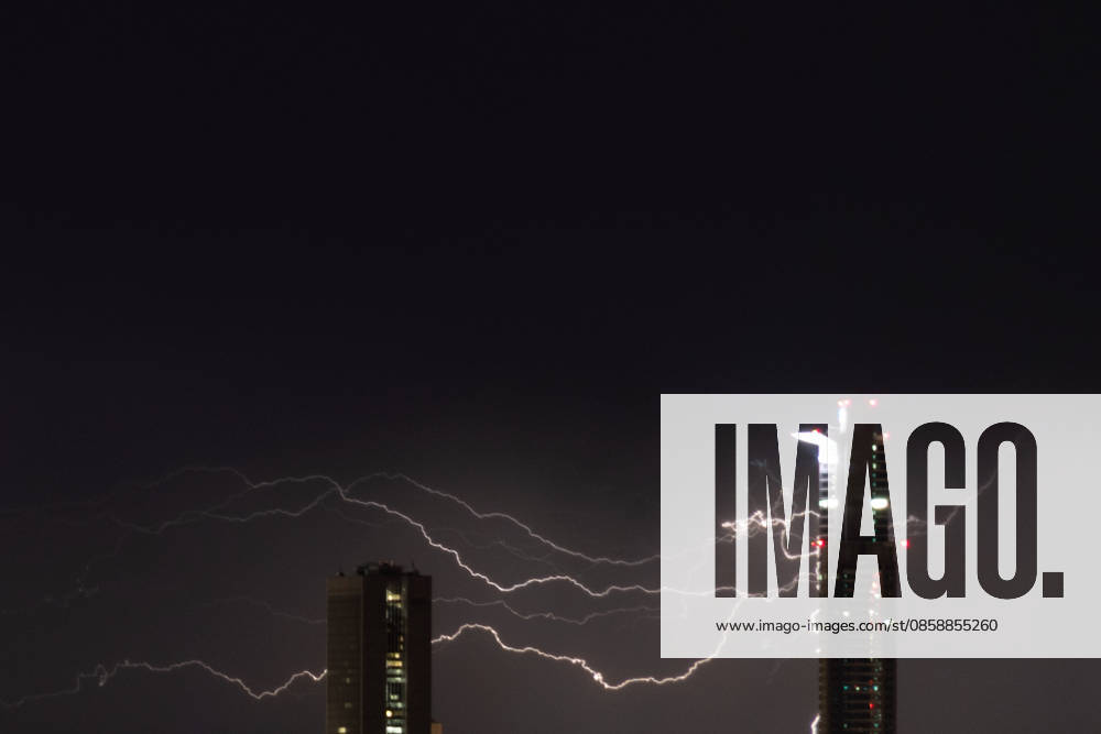 Lightning strikes behind part of the financial district skyline during a thunderstorm in Frankfurt am Main, Germany. Frankfurt Germany - ZUMAb332 20260610_zip_b332_012