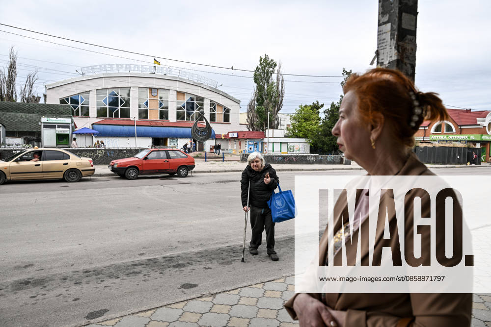 A woman crosses a street in the red zone of the frontline city of Kherson, the area considered the most dangerous due to constant Russian attacks, Kherson, Ukraine, on June 3, 2026. The Russian army attacks the city daily with FPV drones and other unmanned aerial vehicles, deliberately terrorizing civilians. Russian forces conduct hunts for local residents, tracking them with FPV drones and dropping explosives. Police officers, medics, public transport, and urban infrastructure are also targeted. Based on the intensity of attacks, Kherson is informally divided into yellow and red zones, with the red zone subjected to continuous shelling and drone strikes (Photo by Dmytro Smolienko Ukrinform) Life under shelling in frontline Kherso