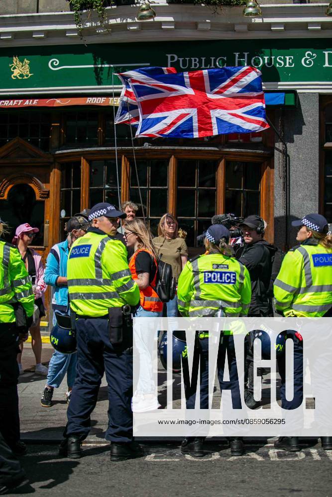 Brighton, UK. 13 June 2026. Members and supporters of anti-immigration group South East Patriots hold a march through the centre of Brighton. A counter-protest, involving about two dozen groups under the banner of Carnival Against Fascism, has also been taking place at the same time, with police officers keeping the two groups apart. South East Patriots claimed the protest is to demand stronger border control, enforcement of immigration laws, and the deportation of illegal immigrants, with the counter protest groups expressing their resistance against the far right as well as to any form of fascism and racism Brighton UK - ZUMAd99_ 20260613_zap_d99_001