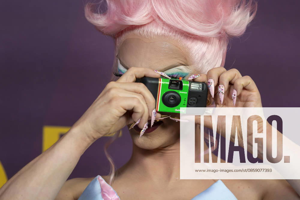MIZ CRACKER takes a photograph of the photographers on the red carpet during the Pride Gala at the Sanctuary in Seattle on Saturday, June 13. 2026. The inaugural celebration benefits Lifelongâ€⠢s programs providing food and nutrition, aging and disability, housing, and HIV care prevention for communities facing barriers. Seattle USA - ZUMAg235 20260613_zap_g235_010