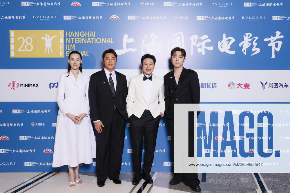 Actor Zhang Songwen and actress Isabella Leong pose for a photo at the closing ceremony for the 28th Shanghai International Film Festival on June 20, 2026 in Shanghai, China.