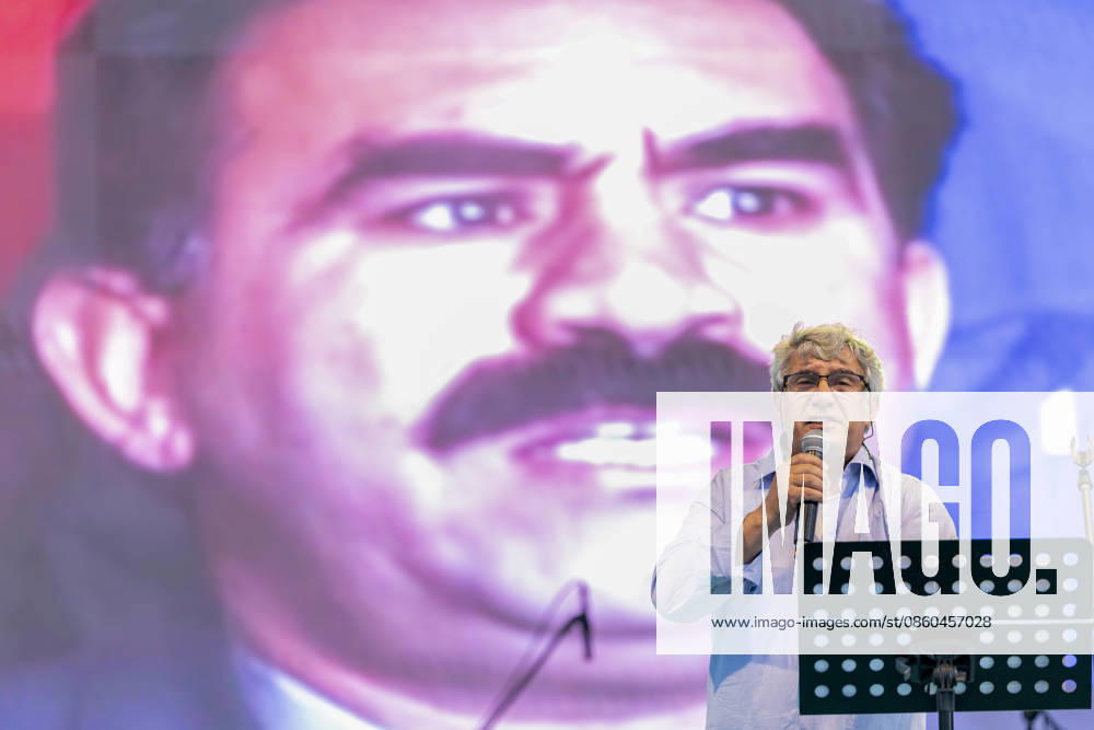 Diyarbakir Turkey Freedom Rally Veysi Aktas, who was imprisoned alongside jailed PKK leader Abdullah Ocalan, speaks in front of a portrait of Ocalan during the Freedom Rally at Istasyon Square in Diyarbakir, Turkey on June 28, 2026. The rally, organized by the DEM Party, the DBP and the Free Women s Movement under the slogan Toward a Free Society with Free Leadership, drew tens of thousands of people calling for Ocalan s release. Similar rallies were also held in Istanbul, Mersin and Van. Diyarbakir Diyarbakir Turkey