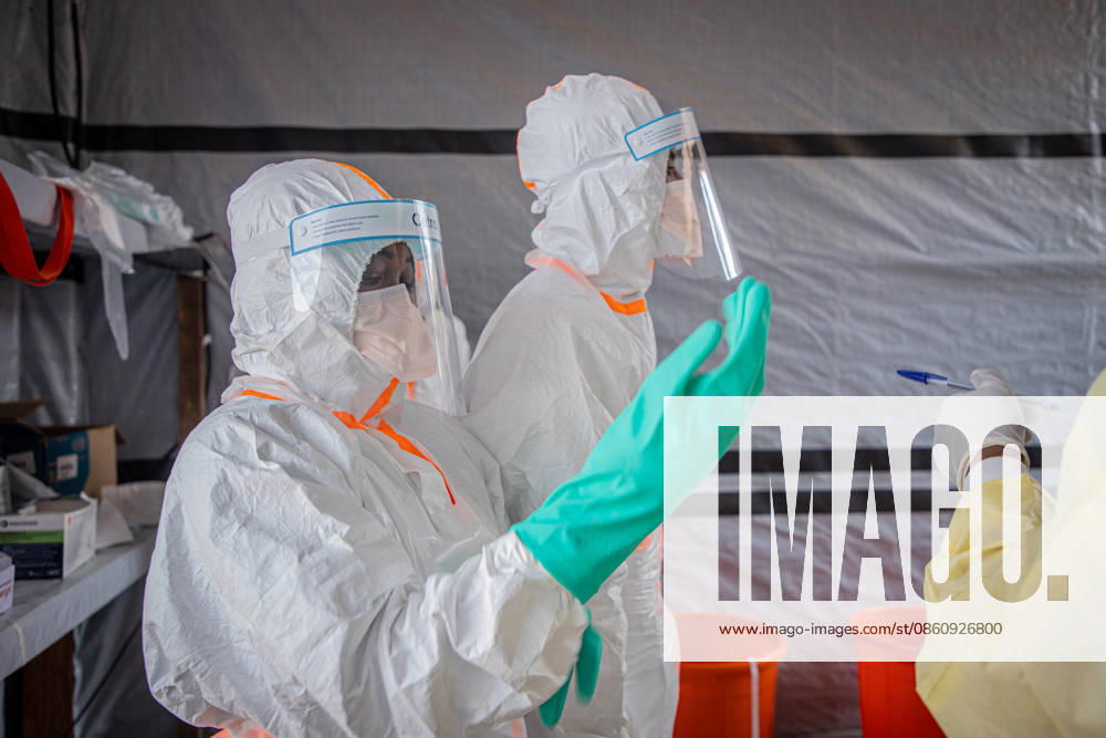 (260706) -- BUNIA, July 6, 2026 -- Medical workers put on protective suits at an Ebola treatment center in Bunia, the capital of Ituri Province in the Democratic Republic of the Congo, July 6, 2026. The death toll from the latest Ebola outbreak in the Democratic Republic of the Congo has surpassed 500, according to a report released Sunday by the country s health authorities. DR CONGO-BUNIA-EBOLA OUTBREAK-DEATH XinxHuashefa