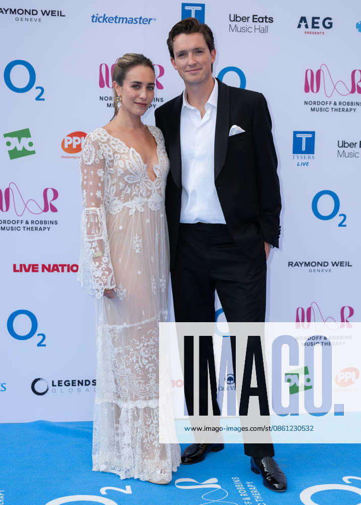 Chloe Stroll and Scott James attends the Nordoff and Robbins O2 Silver Clef Awards at the Royal Albert Hall in London, England. UK. Thursday 9th July 2026.