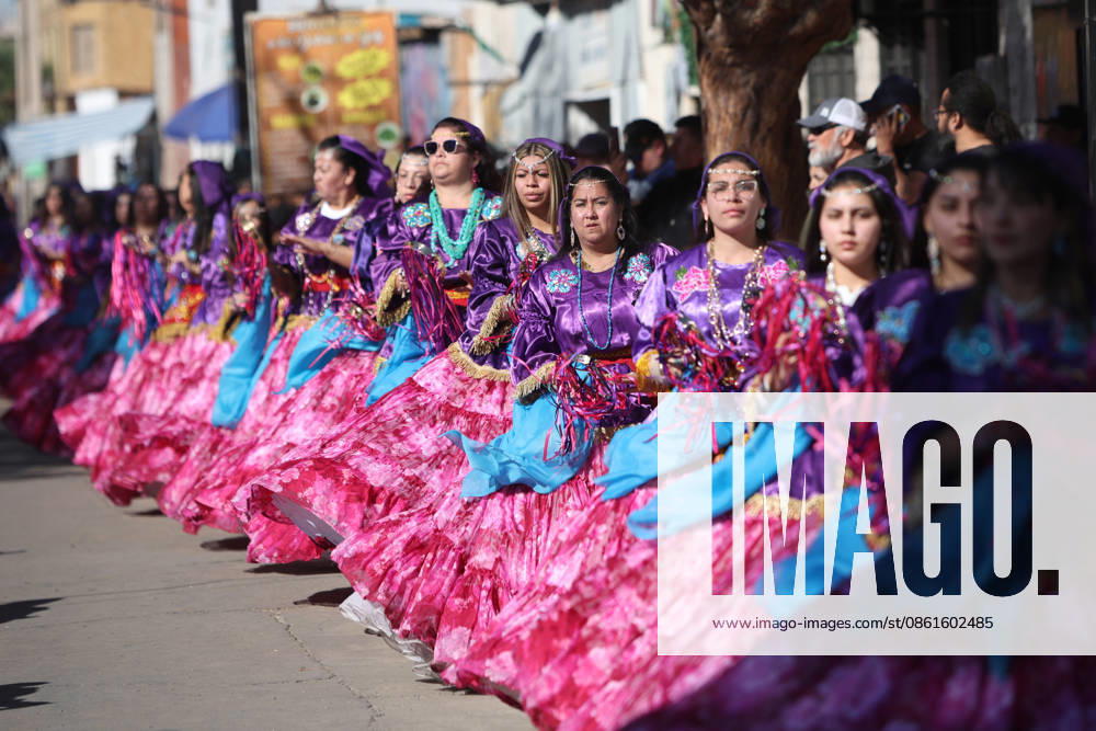 Thousands of people—including the faithful, dancers, musicians, and pilgrims—celebrate and fulfill their vows at the Festival of La Tirana in honor of the Virgin of Carmen, Queen of Tamarugal and patron saint of Chile. Alex Diaz Aton Chile, La Tirana, Chile Aton 1172459