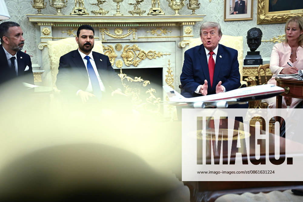 US President Donald Trump (C-R) speaks with Iraqi Prime Minister Ali al-Zaidi (C-L) during their meeting in the Oval Office of the White House in Washington, DC, USA, 14 July 2026. This is Ali al-Zaidis first foreign trip since he took office in May 2026 Washington USA - ZUMAs152 20260714_faa_s152_004
