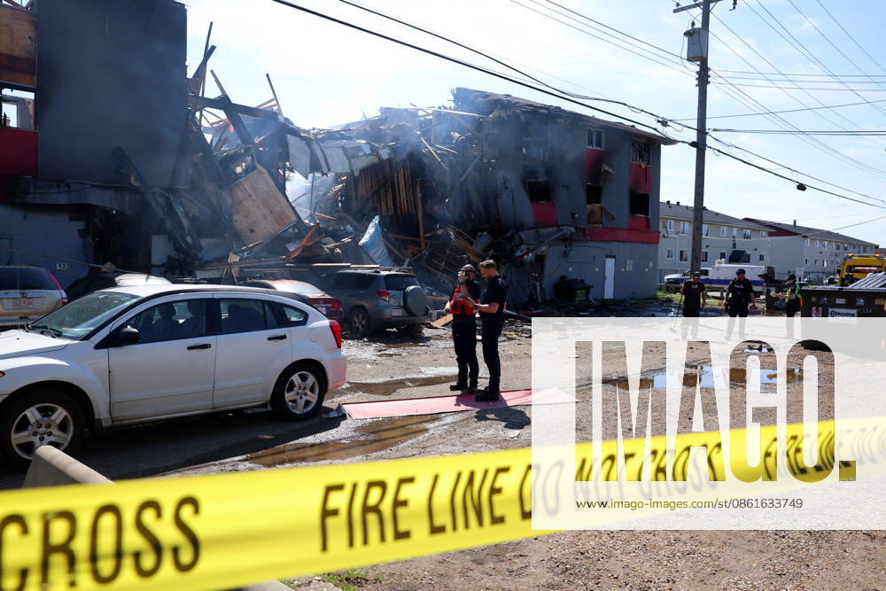 Edmonton police and fire investigators attend the scene of a structure fire at 132 Avenue and 82 Street in Edmonton, on Tuesday, July 14, 2026. Edmonton Canada - ZUMAc35_ 20260714_zaf_c35_108