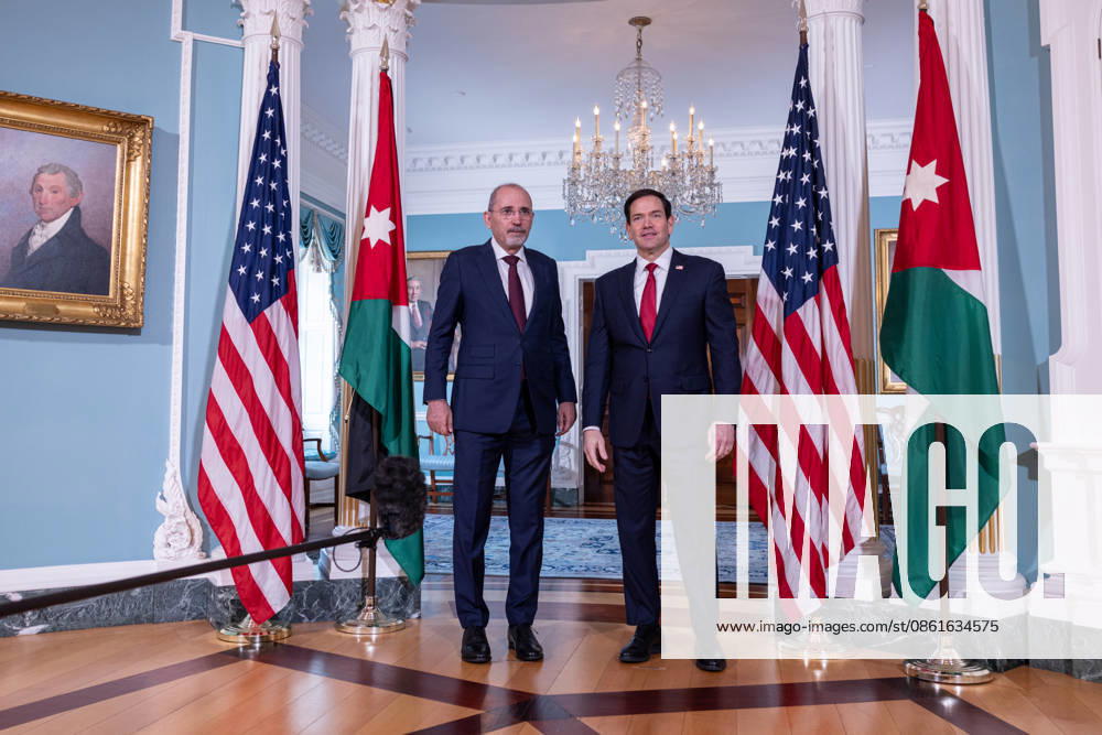 Marco Rubio meets Jordanian FM Safadi at State Department in Washington DC WASHINGTON DC, UNITED STATES - JULY 14: U.S. Secretary of State Marco Rubio (R) greets Jordanian Deputy Prime Minister and Foreign Minister Ayman Safadi (L) ahead of their bilateral meeting at the U.S. State Department in Washington, D.C., United States, on July 14, 2026. Mehmet Eser Anadolu Washington DC United States. Editorial use only. Please get in touch for any other usage.