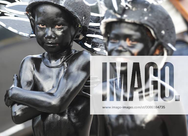 Thailand: Buffalo racing A boy painted in black arrive for Chonburi s annual buffalo race festival in Chonburi province, east of Bangkok on October 23, 2018. The event, which also celebrates the rice harvest, dates back to the buffalo trade in Chonburi, once the trade centre of Thailand s east. CHONBURI Thailand ChaiwatxSubprasom