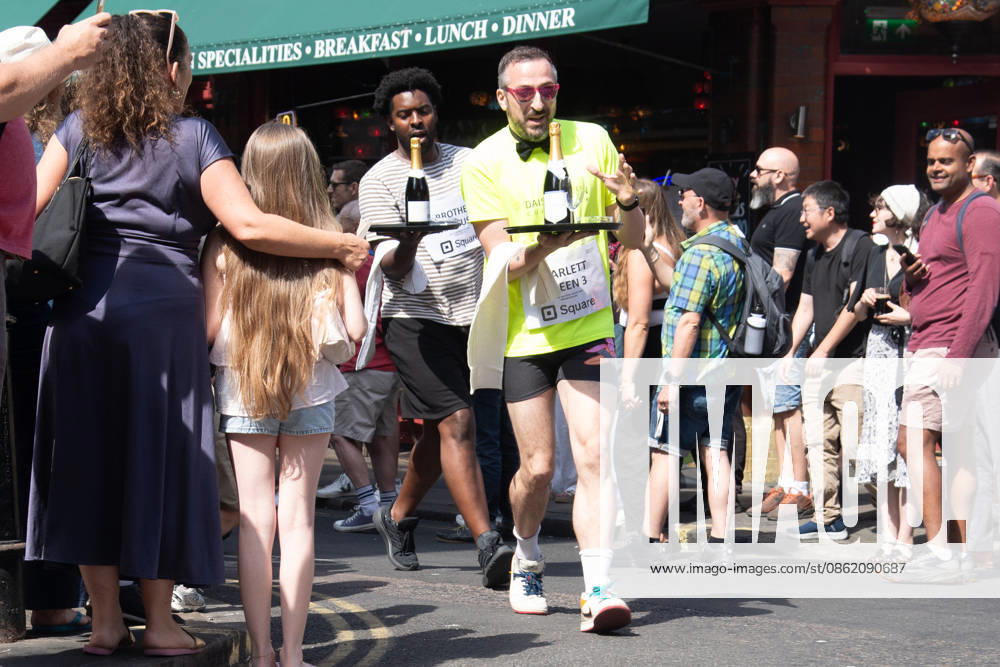 KW29 SOHO Waiters Race at SOHO, London, UK - Sun 19 July 2026 Waiters from various London restaurants take part in the annual SOHO Waiters Race, balancing a champagne bottle and a glass around SOHO in London, England, UK on Sunday 19 July 2026 as part of the SOHO Village Fete., Credit:Justin Ng Avalon UK, England, London, SOHO
