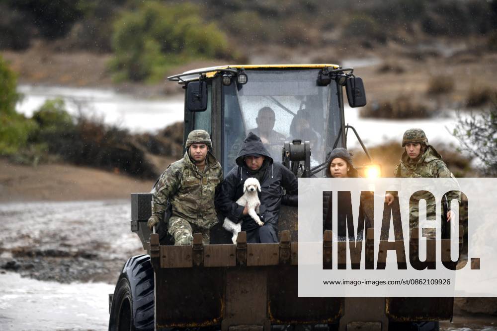 In the municipality of Coquimbo, in the rural area of Tambillos, the Chilean Army is using heavy machinery to rescue families who have been cut off due to the flooding of the Alejandro Pizarro Aton Chile ravines, CHILE Aton 1173897