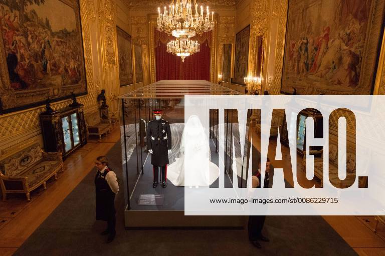 London, London, United Kingdom - The Duchess of Sussexs wedding dress which was created by the British designer Clare Waight Keller Artistic Director at the historic French fashion house Givenchy. The Duke of Sussex uniform is from the Household Cavalry(the Blues and Royals. The outfits are on display at The Royal Collection at Windsor Castle, 25 OCTOBER 2018. PLEASE NOTE, THIS PHOTO IS EMBARGOED FOR PUBLICATION UNTIL 00:01 FRIDAY 26 OCTOBER 2018. London United Kingdom - ZUMAt138 20181025_zap_t138_016