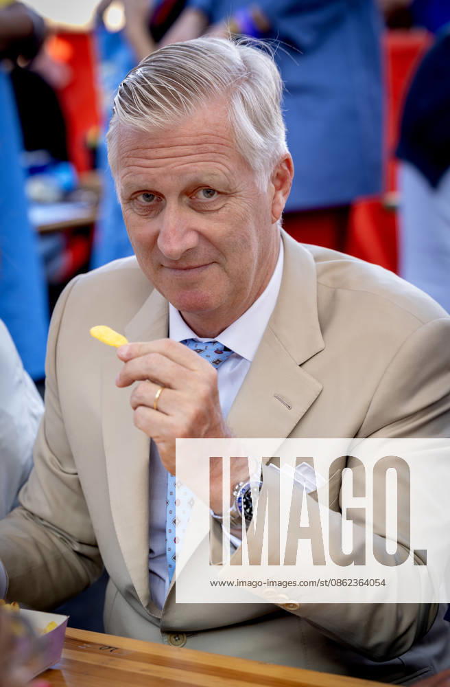 Resto King Philippe - Filip with patat friet during the Everyone to the Table initiative by Resto National at Vossenplein - Place du Jeu de Balle, as part of the National Holiday in Brussels Â