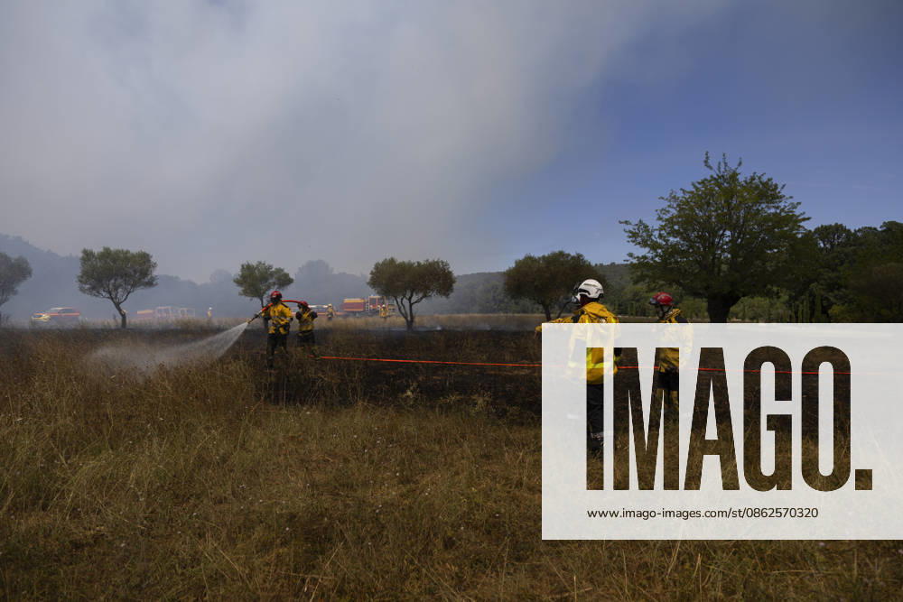 Wildfires in the Var - France Firefighters deploy a hose line to extinguish remaining hotspots during a wildfire at Le Domaine la Marseillaise in Ponteves, crews worked to contain the fire and prevent it from spreading through the dry vegetation. Var, France, July 23, 2026. Photo by Thibaut Durand ABACAPRESS.COM. Ponteves Provence-Alpes-Cote d Azur France