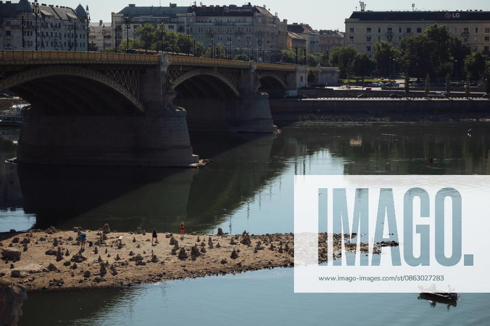Rived Danube reaches historic record low levels in Budapest BUDAPEST, HUNGARY - JULY 30: A view of the Danube River as it reaches historic record-low water levels in Budapest, Hungary, on July 30, 2026. Following weeks of extreme heat and prolonged drought, the receding river has exposed large sections of the riverbed, rocks and sandbars along the capital s waterfront. The unusually low water levels have disrupted river navigation and highlighted the impact of persistent dry weather across Central Europe. Robert Nemeti Anadolu Budapest Hungary. Editorial use only. Please get in touch for any other usage.