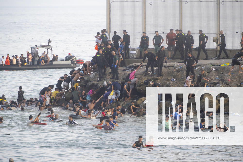 Hundreds of People Swim to Ceuta from Morocco Several people arrive in Spain from Morocco on July 30, 2026, in Ceuta, Spain Hundreds of people of Maghreb origin have crossed into Ceuta from Morocco throughout the day today, by swimming and along the breakwater. Over the past week, more than 2,000 migrants have already done so. JULY 30, 2026 MIGRATION MIGRANTS Ceuta Ceuta, Spain