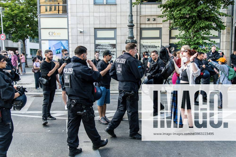 BERLIN, Germany †August 2, 2026: Thousands of people gather at Neptunebrunnen under the slogan â€oeFrom Grief to Anger to Resistance†to condemn the recent attack at Berlin Pride. The peaceful march continued to the Brandenburg Gate with participants carrying banners, posters, and drums. Police arrested one suspect near the demonstration who was carrying a German flag and fireworks. Berlin Germany - ZUMAq101 20260802_zna_q101_182