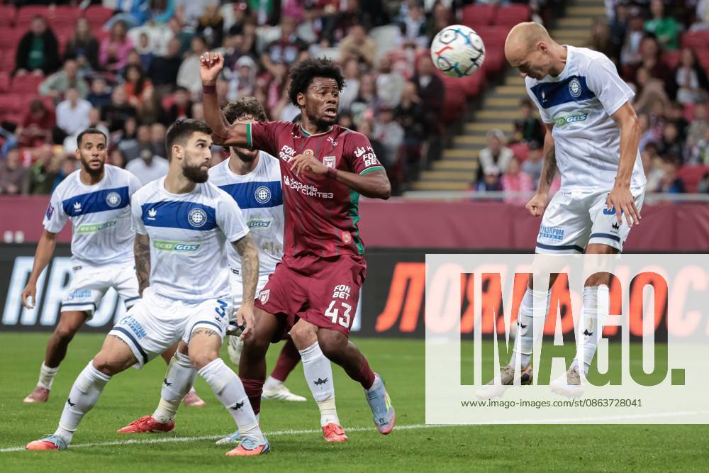 Ak Bars Arena Stadium. The Russian Premier League. Rubin (Kazan) - Orenburg (Orenburg). Jacques-Julien Siwe (Rubin) (center) and Evgeny Bolotov (Orenburg) (right) during the match. SergeyxElagin