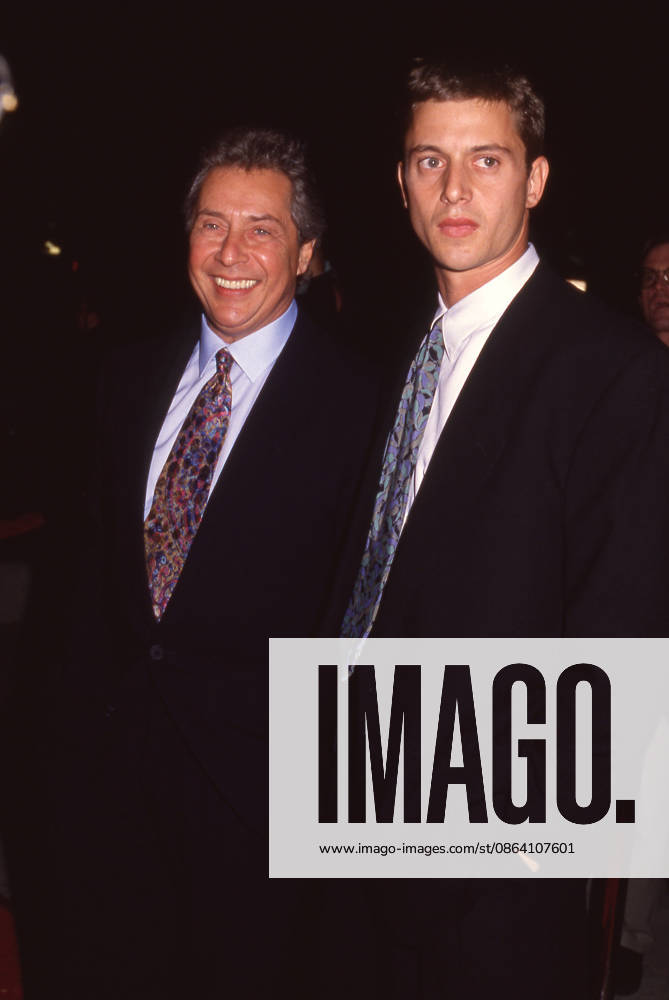 **FILE PHOTO** Mark Rydell Has Passed Away. BEVERLY HILLS, CA - NOVEMBER 14: Director Mark Rydell and son Christopher attend the For the Boys Beverly Hills Premiere on November 14, 1991 at the Academy Theatre in Beverly Hills, California