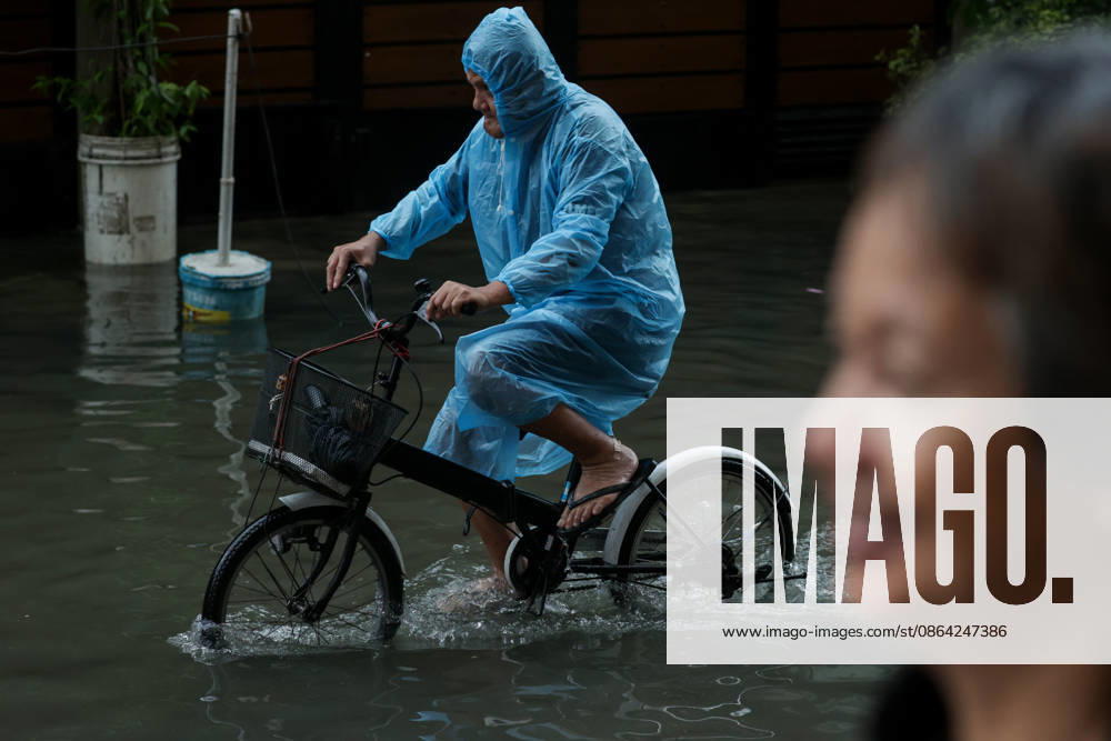 Heavy Rainfall To Continue In Manila A man riding a bicycle wades along a flooded road in Makati City, Manila, Philippines, on August 17, 2026. According to the Philippine Atmospheric, Geophysical, Astronomical and Services Administration s (PAGASA) latest weather forecast, the southwest monsoon will continue to bring heavy rainfall in Luzon, which includes Metro Manila, Ilocos Norte, Batanes, Cagayan, Cordillera Administrative Region, Tarlac, Pampanga, Cavite and Batangas. Makati Philippines