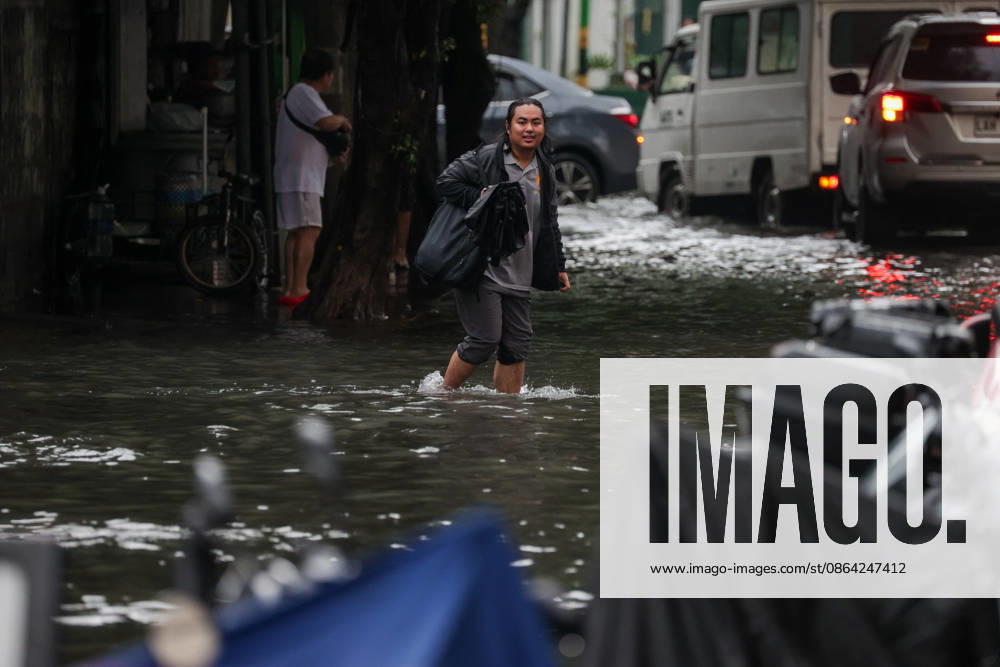 Heavy Rainfall To Continue In Manila A man wades along a flooded road in Makati City, Manila, Philippines, on August 17, 2026. According to the Philippine Atmospheric, Geophysical, Astronomical and Services Administration s (PAGASA) latest weather forecast, the southwest monsoon will continue to bring heavy rainfall in Luzon, which includes Metro Manila, Ilocos Norte, Batanes, Cagayan, Cordillera Administrative Region, Tarlac, Pampanga, Cavite and Batangas. Makati Philippines
