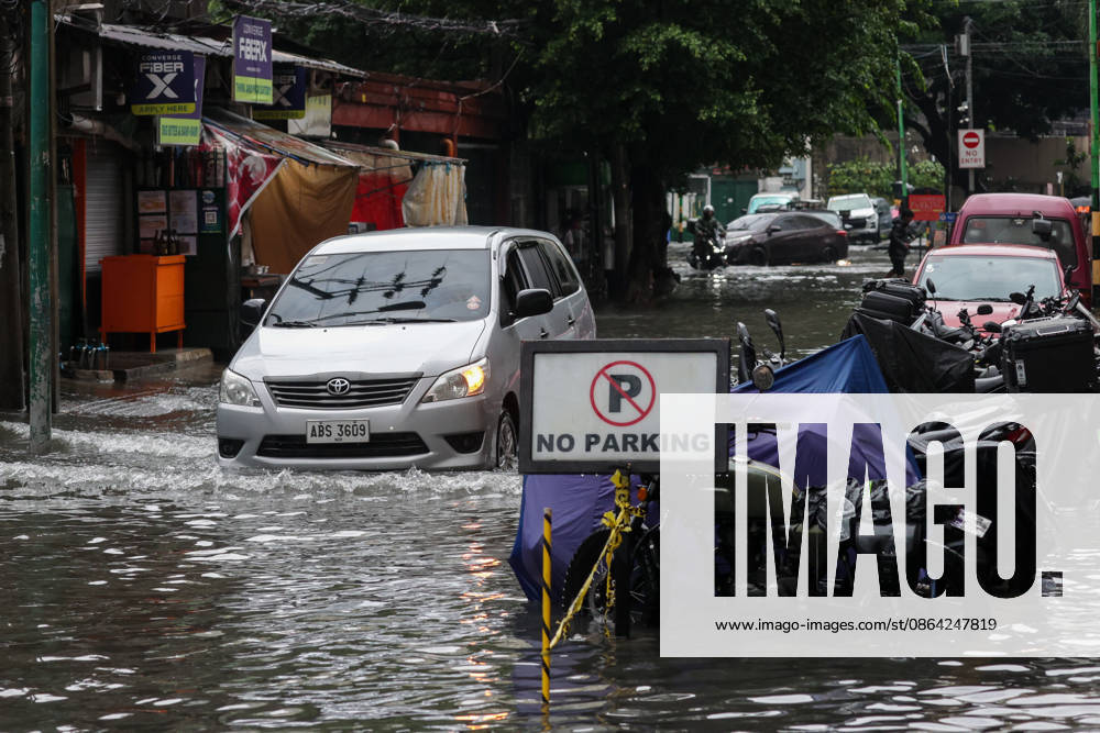 Heavy Rainfall To Continue In Manila A car wades along a flooded road in Makati City, Manila, Philippines, on August 17, 2026. According to the Philippine Atmospheric, Geophysical, Astronomical and Services Administration s (PAGASA) latest weather forecast, the southwest monsoon will continue to bring heavy rainfall in Luzon, which includes Metro Manila, Ilocos Norte, Batanes, Cagayan, Cordillera Administrative Region, Tarlac, Pampanga, Cavite and Batangas. Makati Philippines