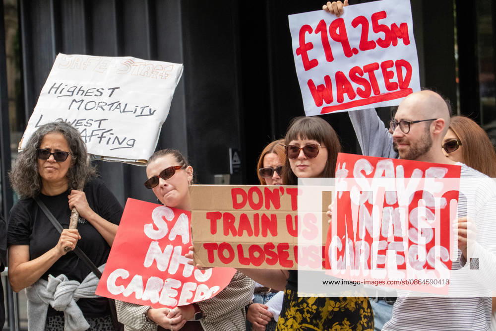 Protesters hold placards expressing their opinion during the demonstration. Unite Union members gather outside the UK government s Number 10 North regional headquarters at Heron House, 47 Lloyd Street, to protest against public funding waste and employment shortfalls in the NHS. Demonstrators carry placards saying Save NHS careers , 19.25 million wasted , and Highest mortality lowest staffing . The rally highlights a major jobs crisis facing newly qualified clinical psychologists and healthcare workers across the North West. Manchester United Kingdom - ZUMAs197 20260821_aaa_s197_071