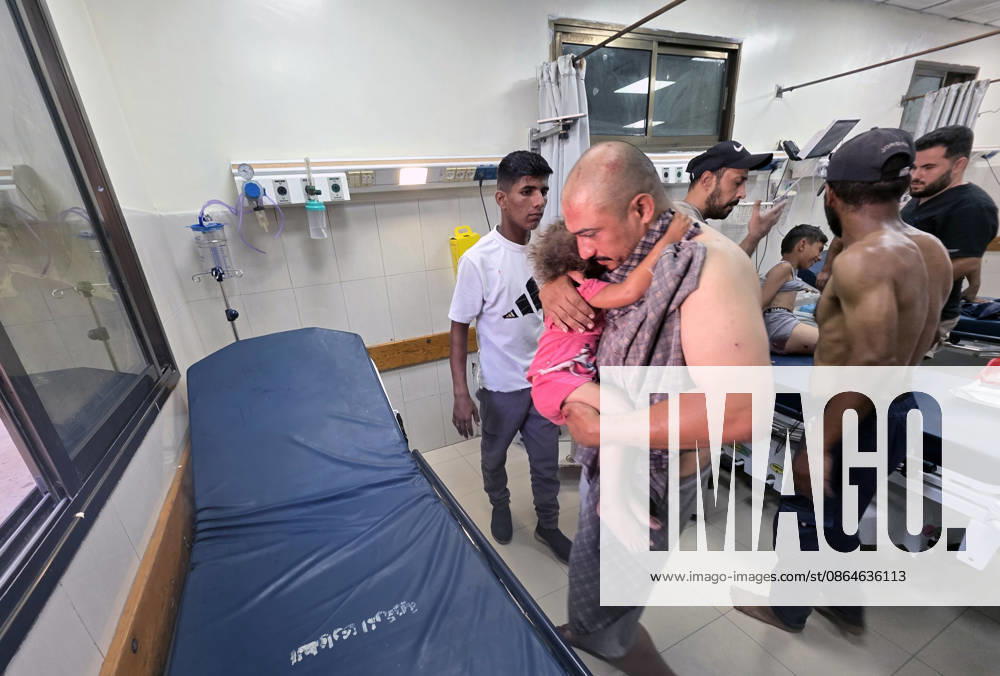 Wounded Palestinians Arrive at Nasser Medical Complex After Israeli Strike Palestinians transport seven wounded people, including children, to Nasser Medical Complex in Khan Younis, in the southern Gaza Strip, on August 23, 2026, following an Israeli strike that targeted civilians in Khan Younis refugee camp. Photo by Tariq Mohammad APA Images Khan Yunis Gaza Strip Palestinian Territory 230826_Khan_Yunis_TM_03(13)