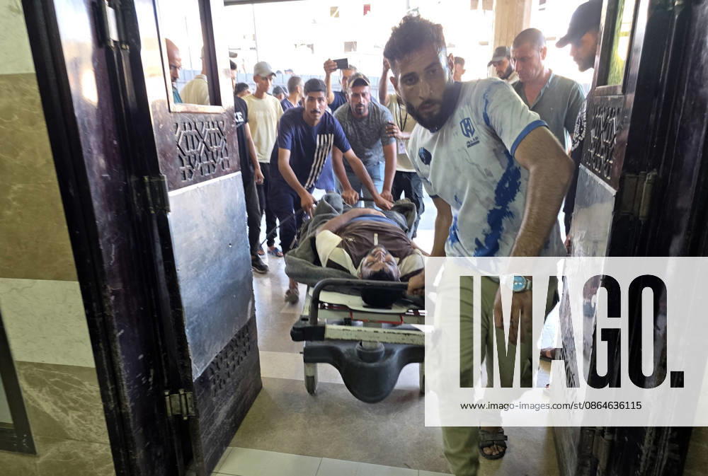 Wounded Palestinians Arrive at Nasser Medical Complex After Israeli Strike Palestinians transport seven wounded people, including children, to Nasser Medical Complex in Khan Younis, in the southern Gaza Strip, on August 23, 2026, following an Israeli strike that targeted civilians in Khan Younis refugee camp. Photo by Tariq Mohammad APA Images Khan Yunis Gaza Strip Palestinian Territory 230826_Khan_Yunis_TM_03(15)