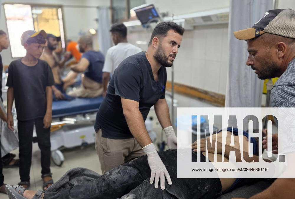 Wounded Palestinians Arrive at Nasser Medical Complex After Israeli Strike Palestinians transport seven wounded people, including children, to Nasser Medical Complex in Khan Younis, in the southern Gaza Strip, on August 23, 2026, following an Israeli strike that targeted civilians in Khan Younis refugee camp. Photo by Tariq Mohammad APA Images Khan Yunis Gaza Strip Palestinian Territory 230826_Khan_Yunis_TM_03(17)