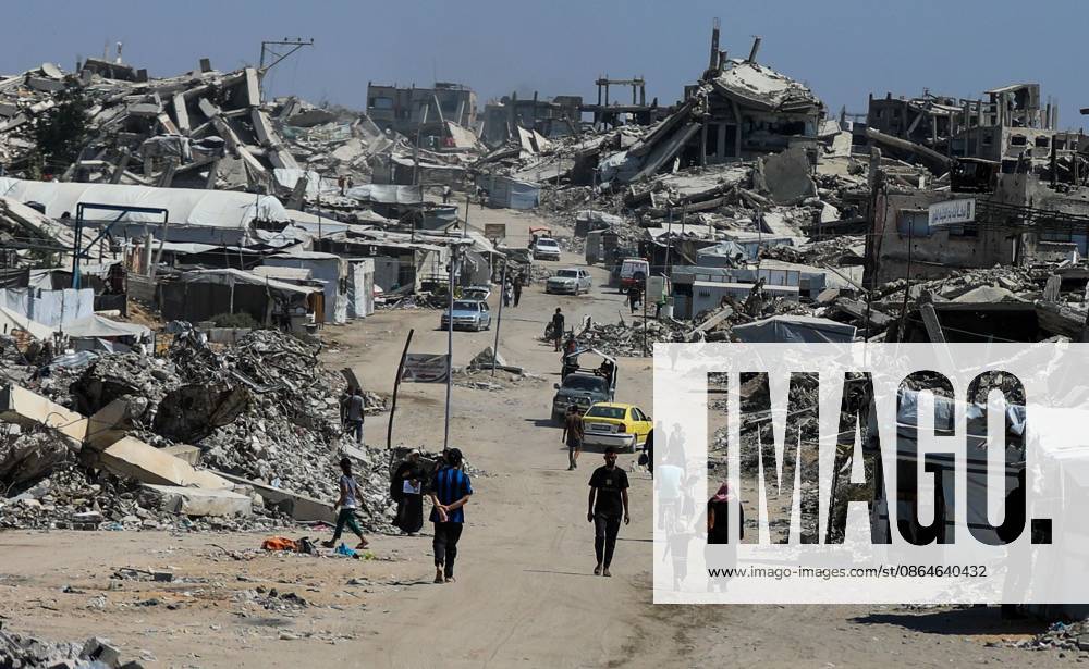 Jabalia, Palestine, State of: JABALIA REFUGEE CAMP, NORTHERN GAZA STRIP, PALESTINE, AUGUST 23, 2026: Palestinians live amid the rubble of destroyed homes and extensive damage in Jabalia refugee camp in the northern Gaza Strip, facing difficult living conditions as they seek safety and basic necessities. Jabalia Palestine, State of - ZUMAq101 20260824_zna_q101_001