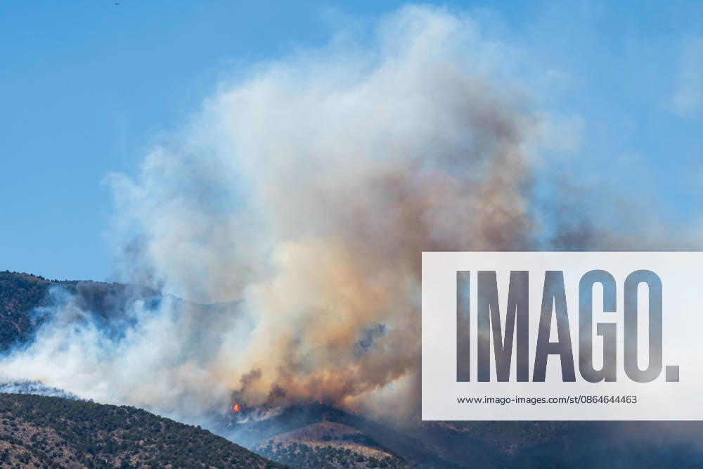 Smoke and flames are visible on a hillside as the Big Mountain Fire burns southwest of Elberta, Utah, United States, on August 23, 2026. State and local air and ground resources were deployed to fight the wildland fire, which rapidly reached an estimated 30 acres with zero containment. Elberta USA - ZUMAm292 20260823_znp_m292_020