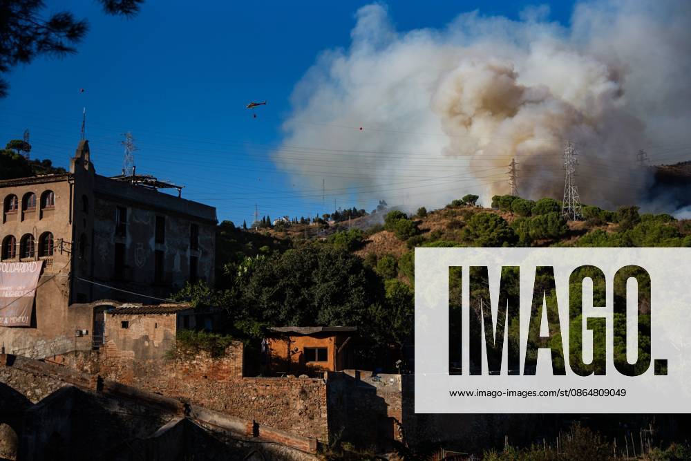 Wildfire Rages in Collserola. BARCELONA, SPAIN - AUGUST 25, 2026. Firefighters battle a devastating wildfire that has scorched dozens of hectares in Collserola Natural Park, prompting the precautionary evacuation of the Can Masdeu social center and several residential homes in the Torre Baro neighborhood. Barcelona Spain