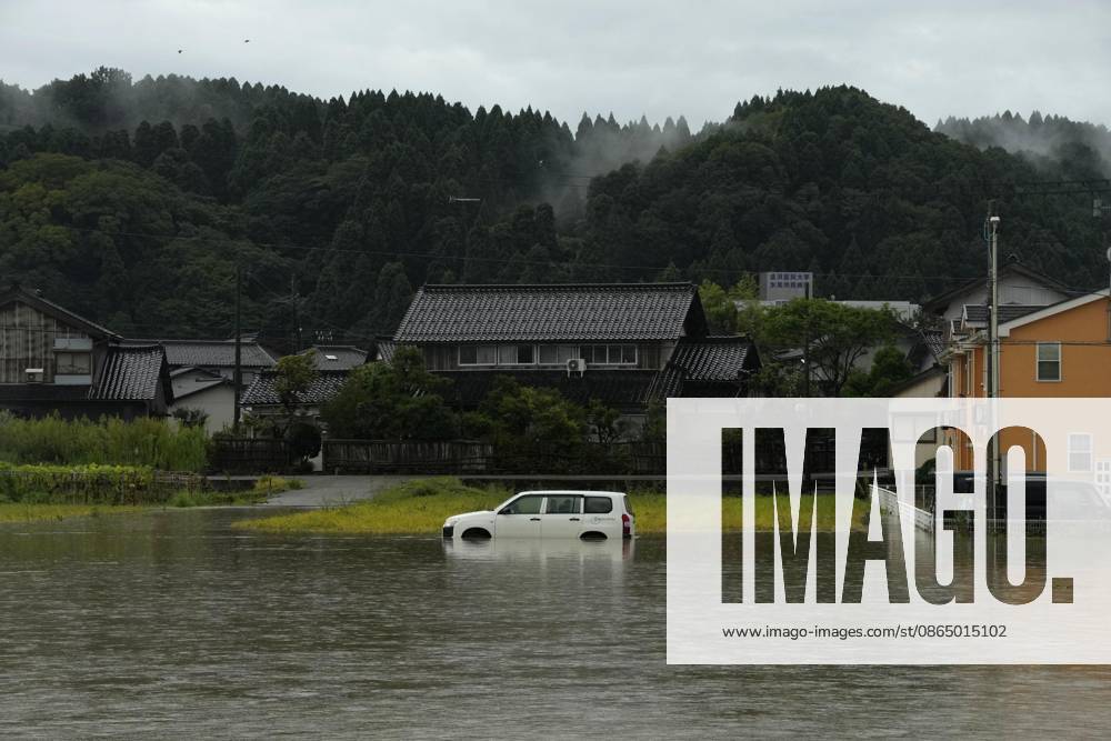 Torrential rain in central Japan Photo taken on Aug. 27, 2026, shows a submerged vehicle in Himi in Toyama Prefecture, central Japan, following torrential rain. A14AA0005626689P