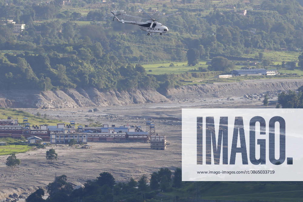 A rescue helicopter takes flight following flash floods at Devighat in Bidur Municipality, Nuwakot district, Nepal, on Thursday, August 27, 2026. The floods, triggered by a glacial collapse and debris flow upstream, have killed at least 270 people and left 826 others out of contact, according to Nepalese authorities, with search and rescue operations continuing. Nuwakot Nepal - ZUMAg200 20260828_zap_g200_001