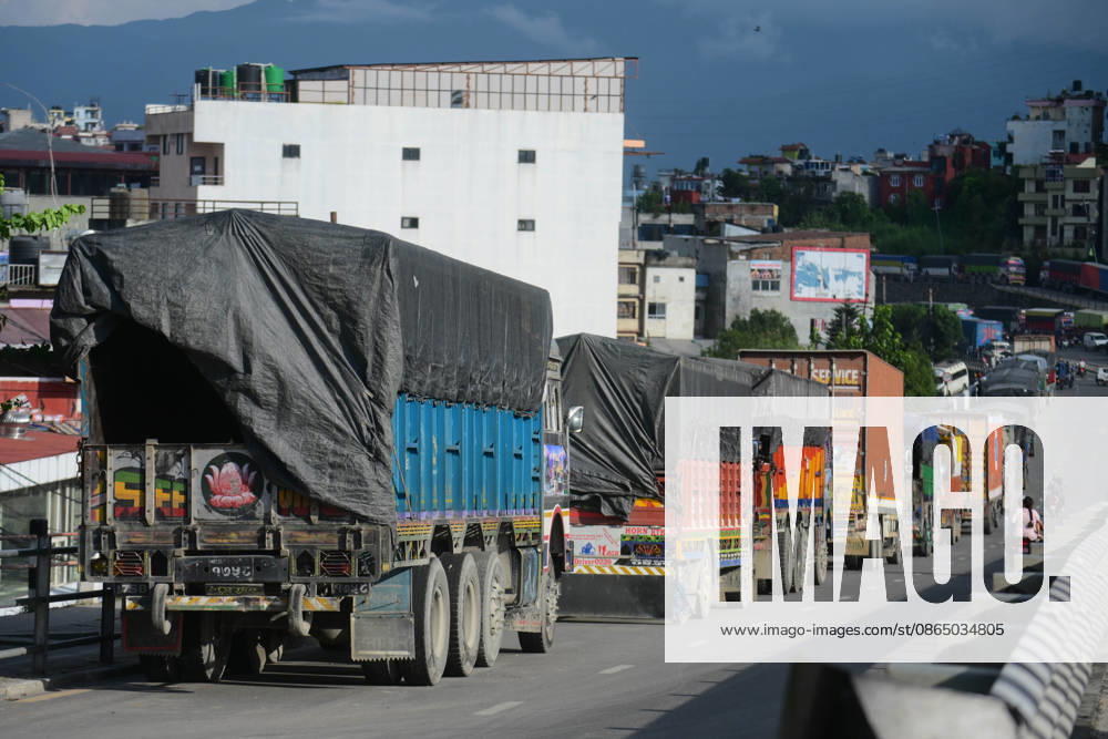Trucks and other vehicles remain stranded along the Kalankiâ€Thankotâ€Nagdhunga route in Kathmandu, Nepal, on August 27, 2026, as major highways remain closed following devastating flash floods and landslides. The stranded vehicles have occupied multiple lanes along the road, causing traffic congestion and further disrupting movement in the area. The floods swept through Rasuwa and other parts of central Nepal before surging downstream along the Trishuli and Narayani river systems, damaging roads, bridges, settlements and other infrastructure. The Nagdhungaâ€Muglin route, a key road connection between Kathmandu and other parts of the country, has been closed, disrupting the movem - ZUMAs330 20260827_zsp_s330_001
