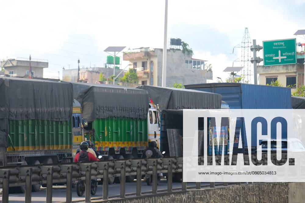 Trucks and other vehicles remain stranded along the Kalankiâ€Thankotâ€Nagdhunga route in Kathmandu, Nepal, on August 27, 2026, as major highways remain closed following devastating flash floods and landslides. The stranded vehicles have occupied multiple lanes along the road, causing traffic congestion and further disrupting movement in the area. The floods swept through Rasuwa and other parts of central Nepal before surging downstream along the Trishuli and Narayani river systems, damaging roads, bridges, settlements and other infrastructure. The Nagdhungaâ€Muglin route, a key road connection between Kathmandu and other parts of the country, has been closed, disrupting the movem - ZUMAs330 20260827_zsp_s330_002