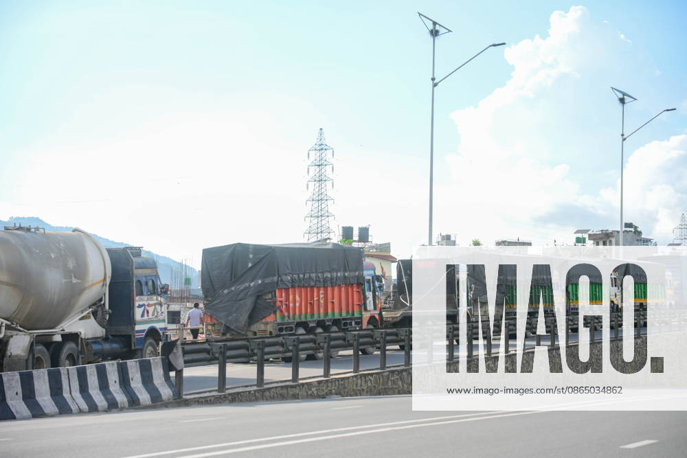Trucks and other vehicles remain stranded along the Kalankiâ€Thankotâ€Nagdhunga route in Kathmandu, Nepal, on August 27, 2026, as major highways remain closed following devastating flash floods and landslides. The stranded vehicles have occupied multiple lanes along the road, causing traffic congestion and further disrupting movement in the area. The floods swept through Rasuwa and other parts of central Nepal before surging downstream along the Trishuli and Narayani river systems, damaging roads, bridges, settlements and other infrastructure. The Nagdhungaâ€Muglin route, a key road connection between Kathmandu and other parts of the country, has been closed, disrupting the movem - ZUMAs330 20260827_zsp_s330_007
