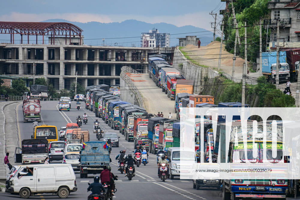 Trucks and other vehicles remain stranded along the Kalankiâ€Thankotâ€Nagdhunga route in Kathmandu, Nepal, on August 27, 2026, as major highways remain closed following devastating flash floods and landslides. The stranded vehicles have occupied multiple lanes along the road, causing traffic congestion and further disrupting movement in the area. The floods swept through Rasuwa and other parts of central Nepal before surging downstream along the Trishuli and Narayani river systems, damaging roads, bridges, settlements and other infrastructure. The Nagdhungaâ€Muglin route, a key road connection between Kathmandu and other parts of the country, has been closed, disrupting the movem - ZUMAs330 20260827_zsp_s330_018
