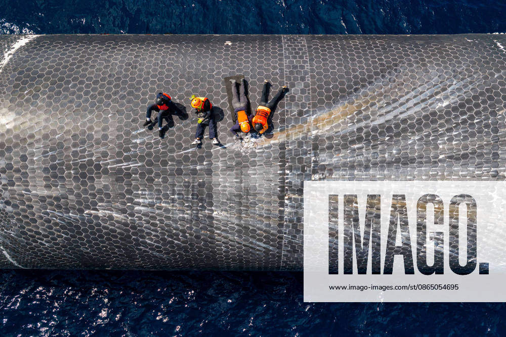 SpaceX engineers spent several days inspecting Ship 40 in the waters off Christmas Island as seen in pictures released on Thursday, August 27, 2026. They collected heatshield samples and gained vital insight into how the vehicle handled reentry, with improvements now planned for future vehicles. Starship has now been loaded onto a semi-submersible ship to begin the several-month journey back to Starbase. WAX2026082702 SPACEX