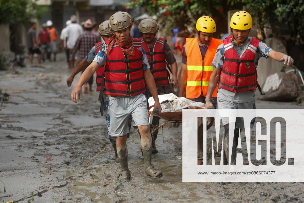 Nepal Disaster: The Second Day Of Devastation, Rescue And Recovery Security personnel collect the bodies of flood victims in Nuwakot, Nepal, on August 27, 2026, following an outburst of a glacial lake in Tibet. Rescue and recovery operations continue in the flood-affected area as authorities search for victims and assess the extent of the damage. Nuwakot Nepal