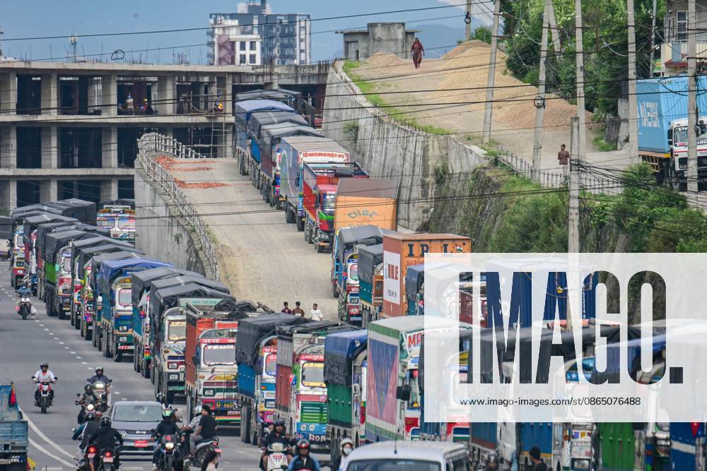 KATHMANDU, NEPAL, AUGUST 27, 2026: Trucks and other vehicles remain stranded along the KalankiÃ¢â‚¬ThankotÃ¢â‚¬Nagdhunga route in Kathmandu as major highways remain closed following flash floods and landslides in parts of Nepal. The stranded vehicles occupy multiple lanes, causing severe traffic congestion and disrupting the movement of people and goods. The floods and landslides damaged roads, bridges, settlements and other infrastructure, while the closure of the NagdhungaÃ¢â‚¬Muglin route has disrupted a key road connection between Kathmandu and other parts of the country. Kathmandu Nepal - ZUMAq101 20260827_zna_q101_059