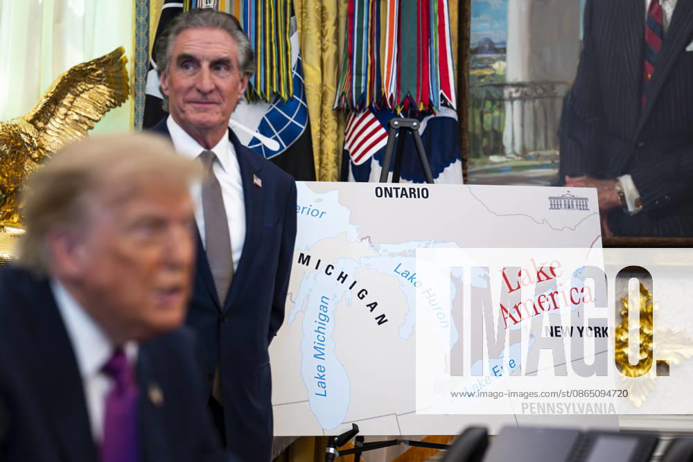 A poster shows the name change from Lake Ontario to Lake America beside United States Secretary of the Interior and Chair, National Energy Council and White House Energy Czar DOUG BURGUM, as United States President DONALD J TRUMP signs an executive order on the renaming, amid a recent trade war, in the Oval Office of the White House in Washington, DC Washington USA - ZUMAs152 20260827_faa_s152_003