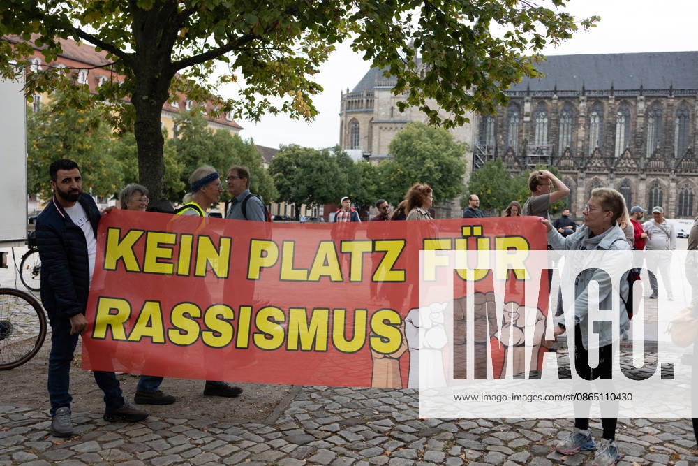 Migra-Streik rally against racism and social exclusion in Germany s Magdeburg MAGDEBURG, GERMANY - AUGUST 27: Business owners, organizers and supporters take part in a rally against racism and social exclusion outside the Saxony-Anhalt state parliament at Domplatz in Magdeburg, Germany, on August 27, 2026. The rally was held as part of the Migra-Streik, during which participating migrant-run businesses across Magdeburg voluntarily closed from 10 a.m. to 3 p.m. to call for solidarity and the protection of a free and democratic society, ahead of Saxony-Anhalt s state election on September 6. Somaya Abdelrahman Anadolu Magdeburg Germany. Editorial use only. Please get in touch for any other usage.