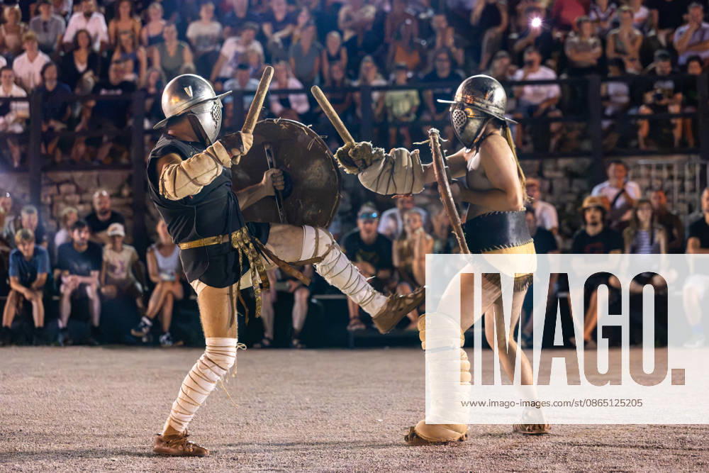 Gladiator fights in Pula, Croatia Members of gladiator school Spectacvla Gladiatoria dressed as Roman gladiators perform a staged combat demonstration during the event Spectacvla Antiqva at the Arena of Pula on August 27, 2026. in Pula, Croatia. SreckoxNiketic PIXSELL