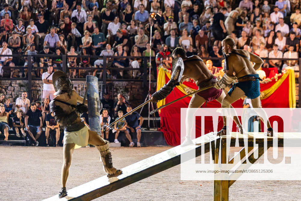 Gladiator fights in Pula, Croatia Members of gladiator school Spectacvla Gladiatoria dressed as Roman gladiators perform a staged combat demonstration during the event Spectacvla Antiqva at the Arena of Pula on August 27, 2026. in Pula, Croatia. SreckoxNiketic PIXSELL