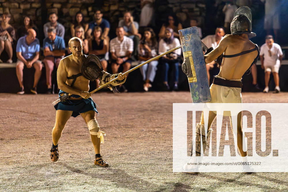 Gladiator fights in Pula, Croatia Members of gladiator school Spectacvla Gladiatoria dressed as Roman gladiators perform a staged combat demonstration during the event Spectacvla Antiqva at the Arena of Pula on August 27, 2026. in Pula, Croatia. SreckoxNiketic PIXSELL