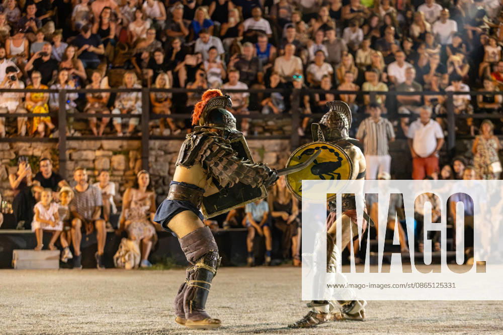 Gladiator fights in Pula, Croatia Members of gladiator school Spectacvla Gladiatoria dressed as Roman gladiators perform a staged combat demonstration during the event Spectacvla Antiqva at the Arena of Pula on August 27, 2026. in Pula, Croatia. SreckoxNiketic PIXSELL